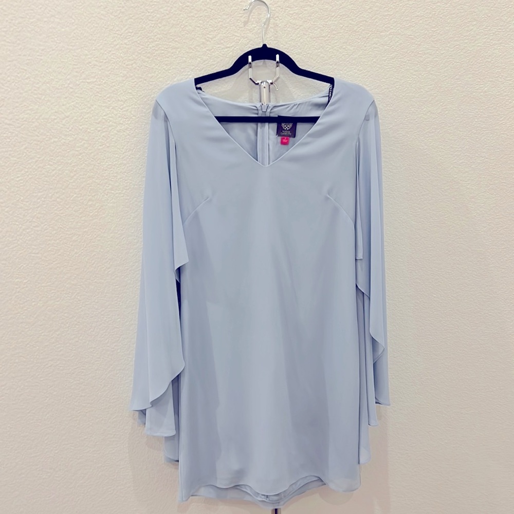 Baby blue, short, fancy dress with float arm pieces that are attached